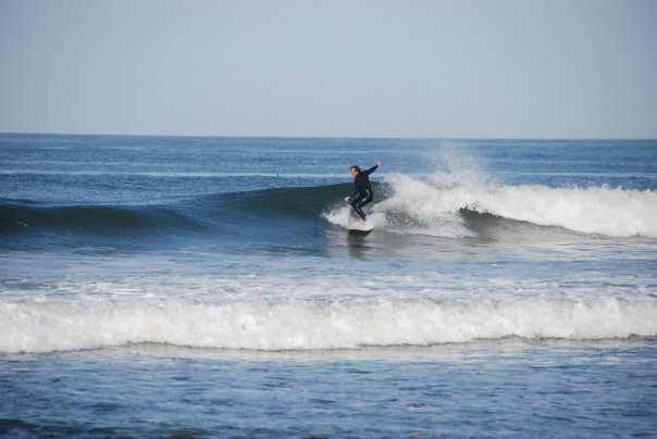 Larry catching a few waves