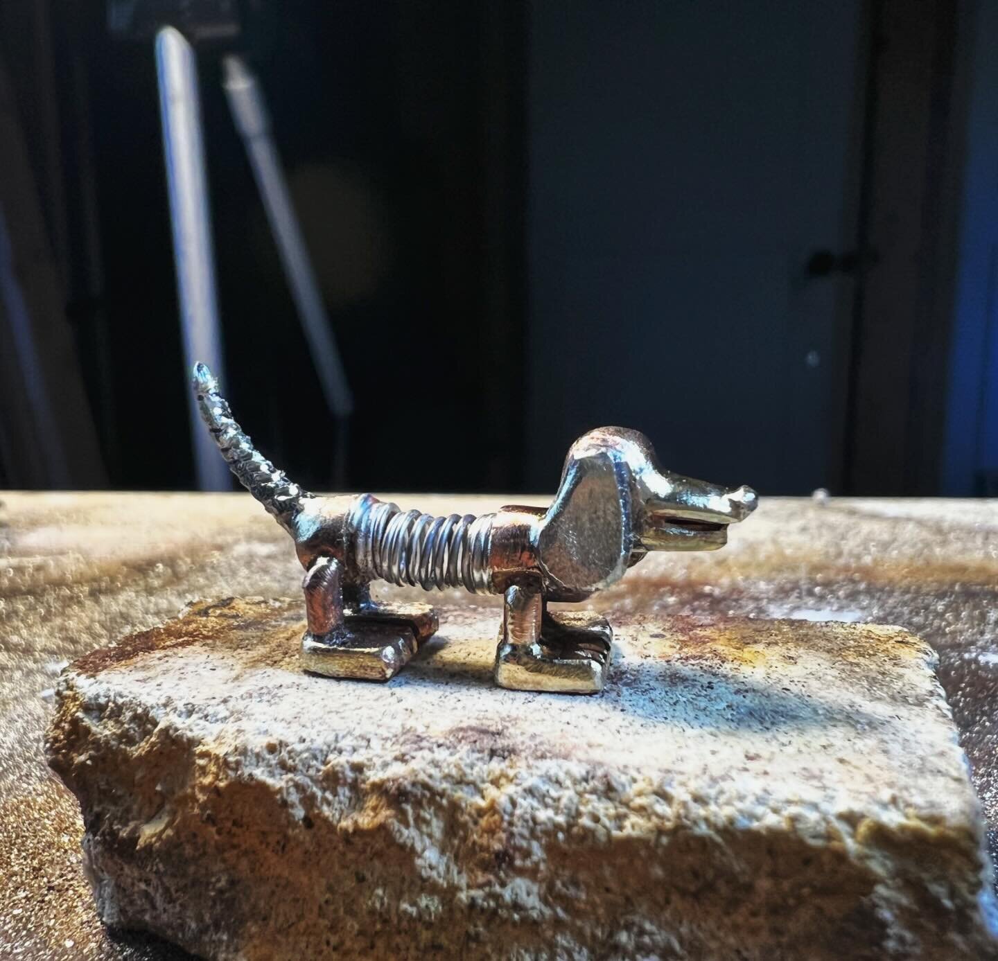 Slinky Dog fabricated out of sterling silver, brass and copper..