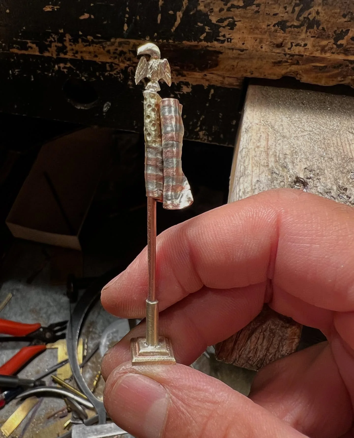 Finishing touches on a fabricated American flag.