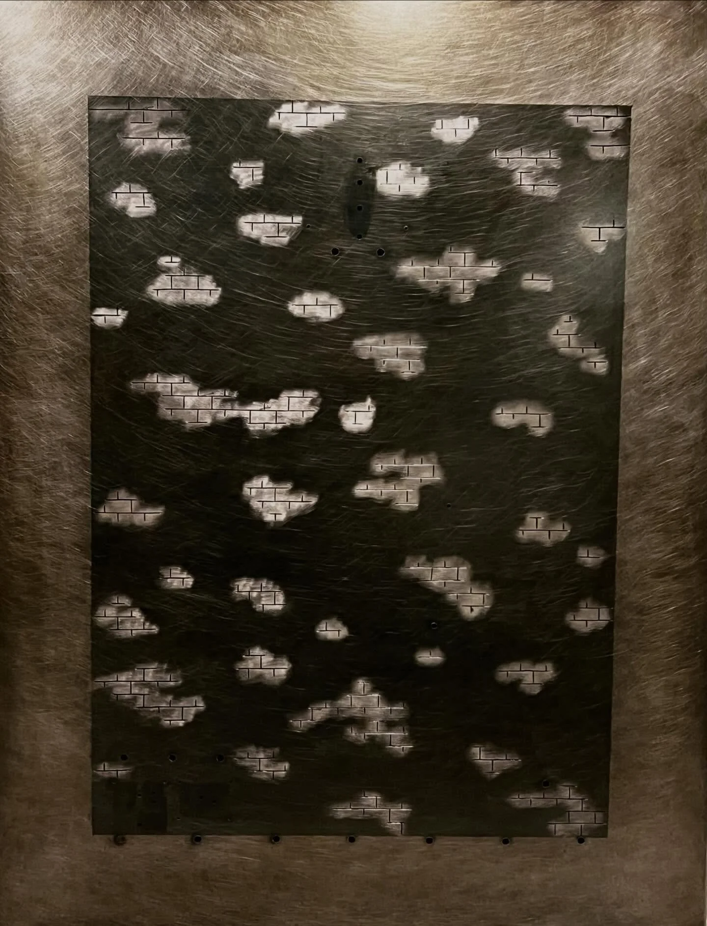 Some backplates are more time consuming than others, and this is definitely one of them. It starts with cleaning and sanding the steel plate, then penciling in the brick design and cutting the details with a wheel. After that, it becomes a cycle of s