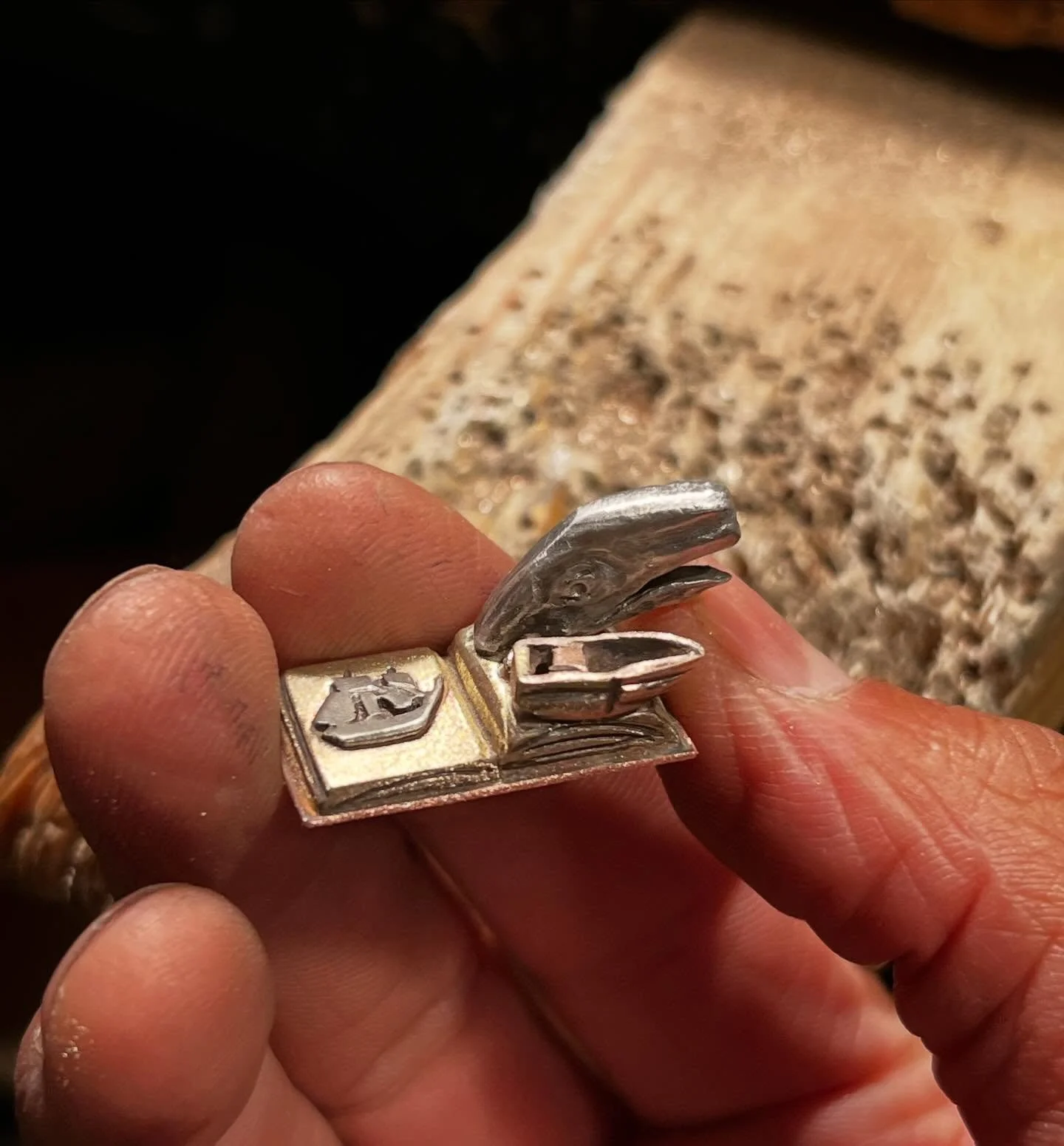 Latest work: a tiny Moby Dick book with the whale and boat extruding from the page. A piece fabricated from sterling silver, brass, and copper.

I&rsquo;ve also included my iterations of Moby Dick over the years. The tabletop piece (2021) still in my