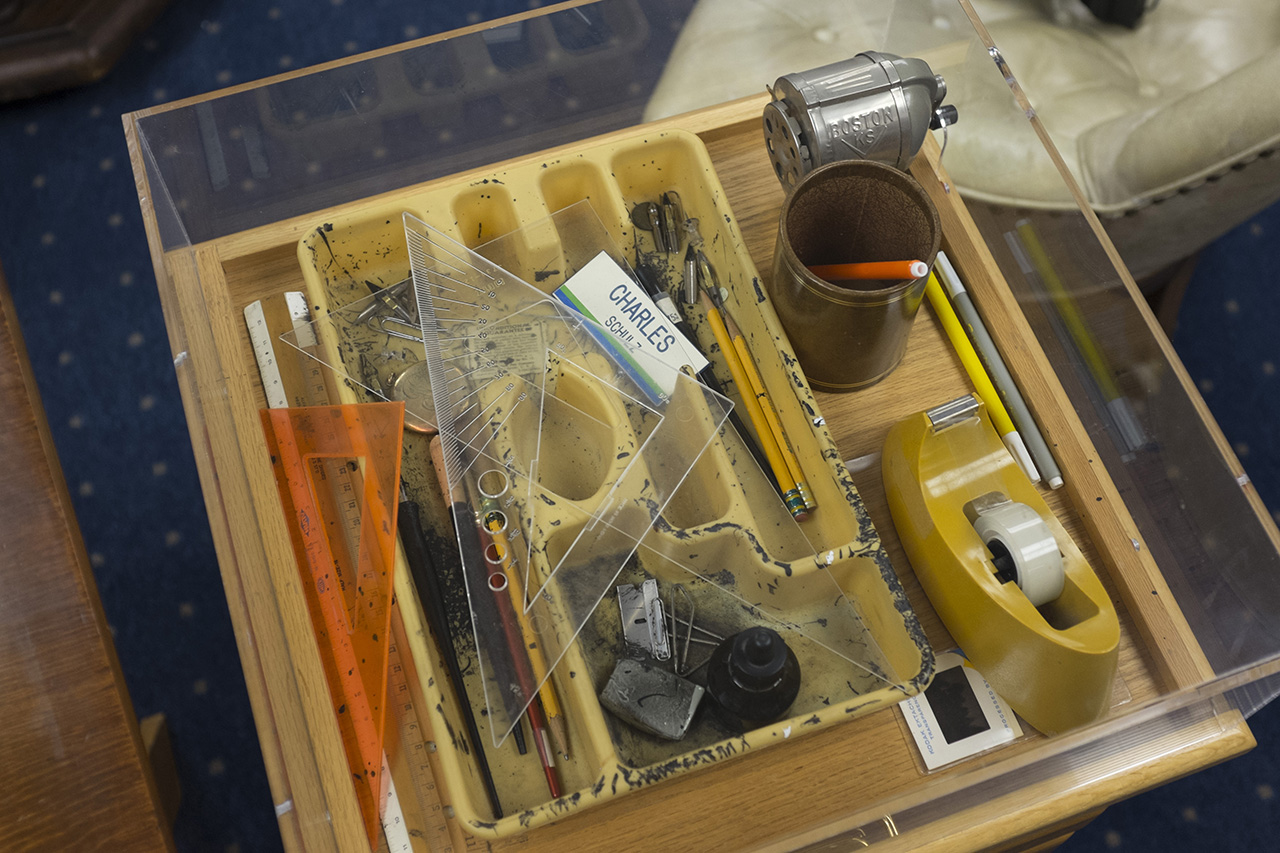 They put a plexiglass case over his tools--they're left exactly how they were when he passed away.