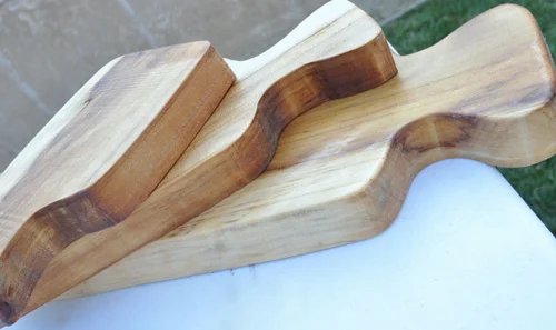 Source: diy project: homemade cutting boards Materials - untreated hardwood plank (these are made with Norfolk pine) (it is important to get untreated wood since you are using these for food prep) - jigsaw - orbital sander - paper - scissors - pencil - mineral oil + rags
