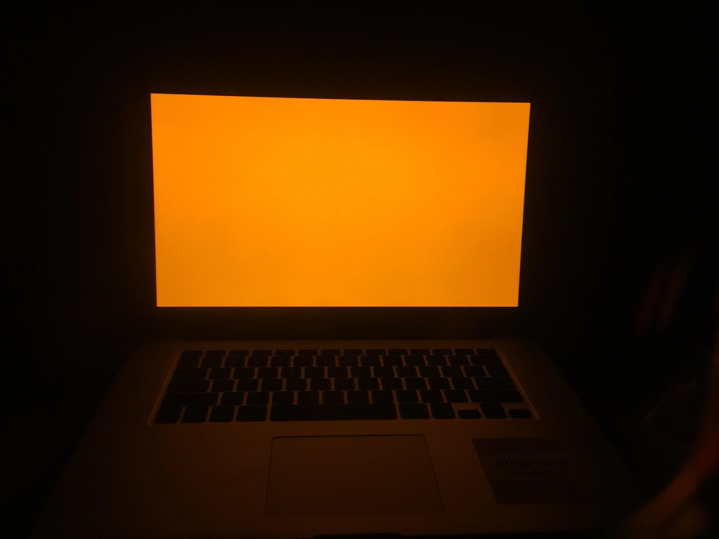 Laptop screen through UV blue light blocking glasses.