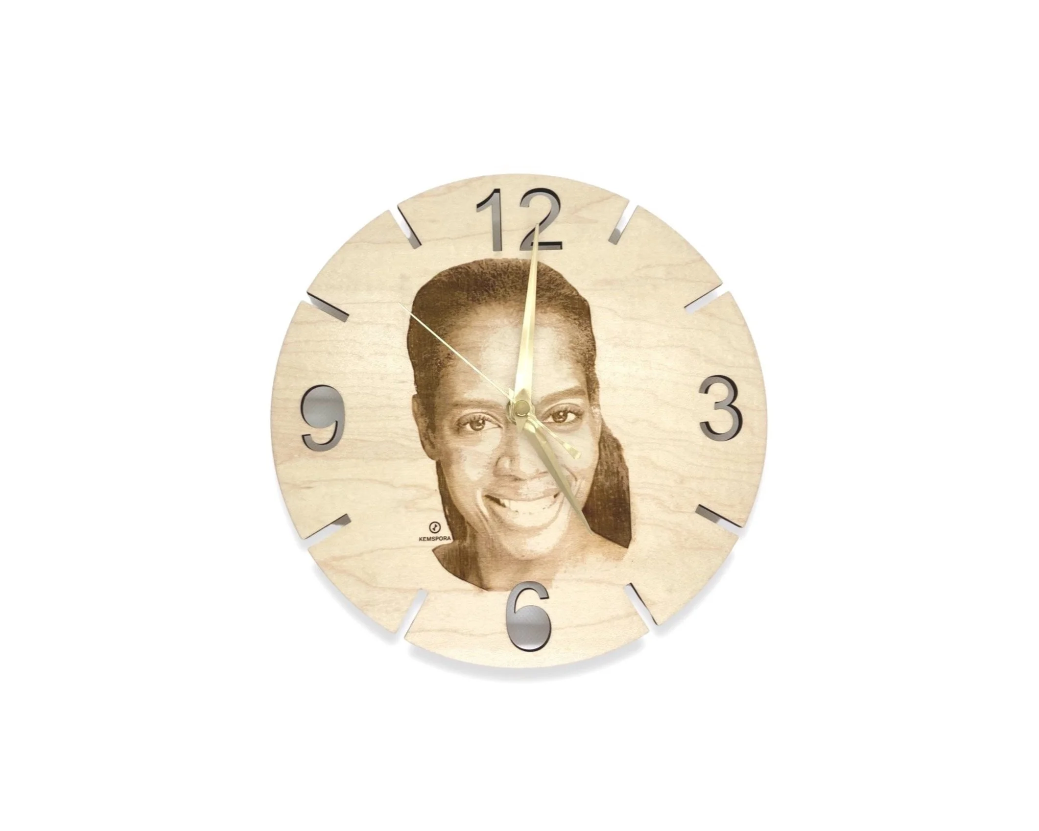 A Kemspora custom art laser engraving, on a uniquely stylish circular wooden clock face, of a woman's head, smiling with long hair.