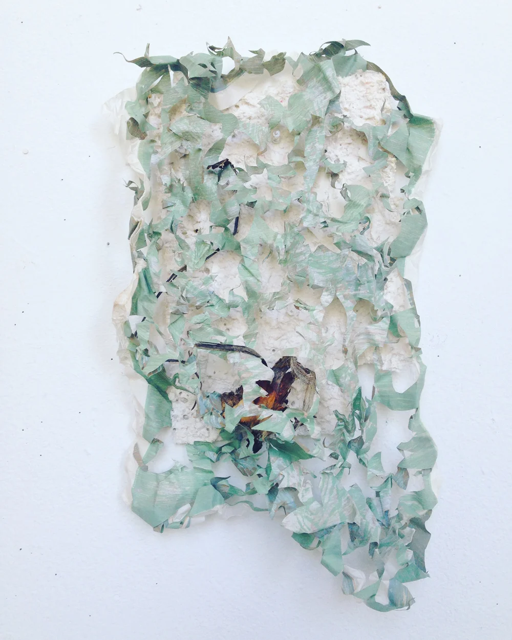 2016  mixed media collage: woodcut monoprint, paper pulp, and found material 