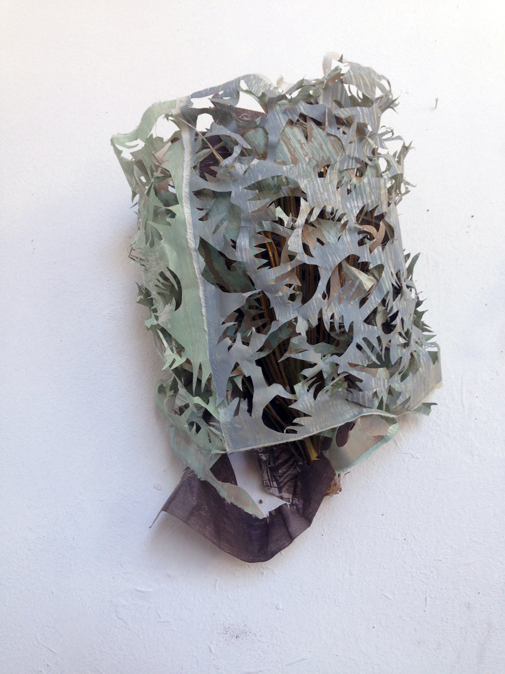 2016 mixed media collage: woodcut monoprint, paper pulp, and found material