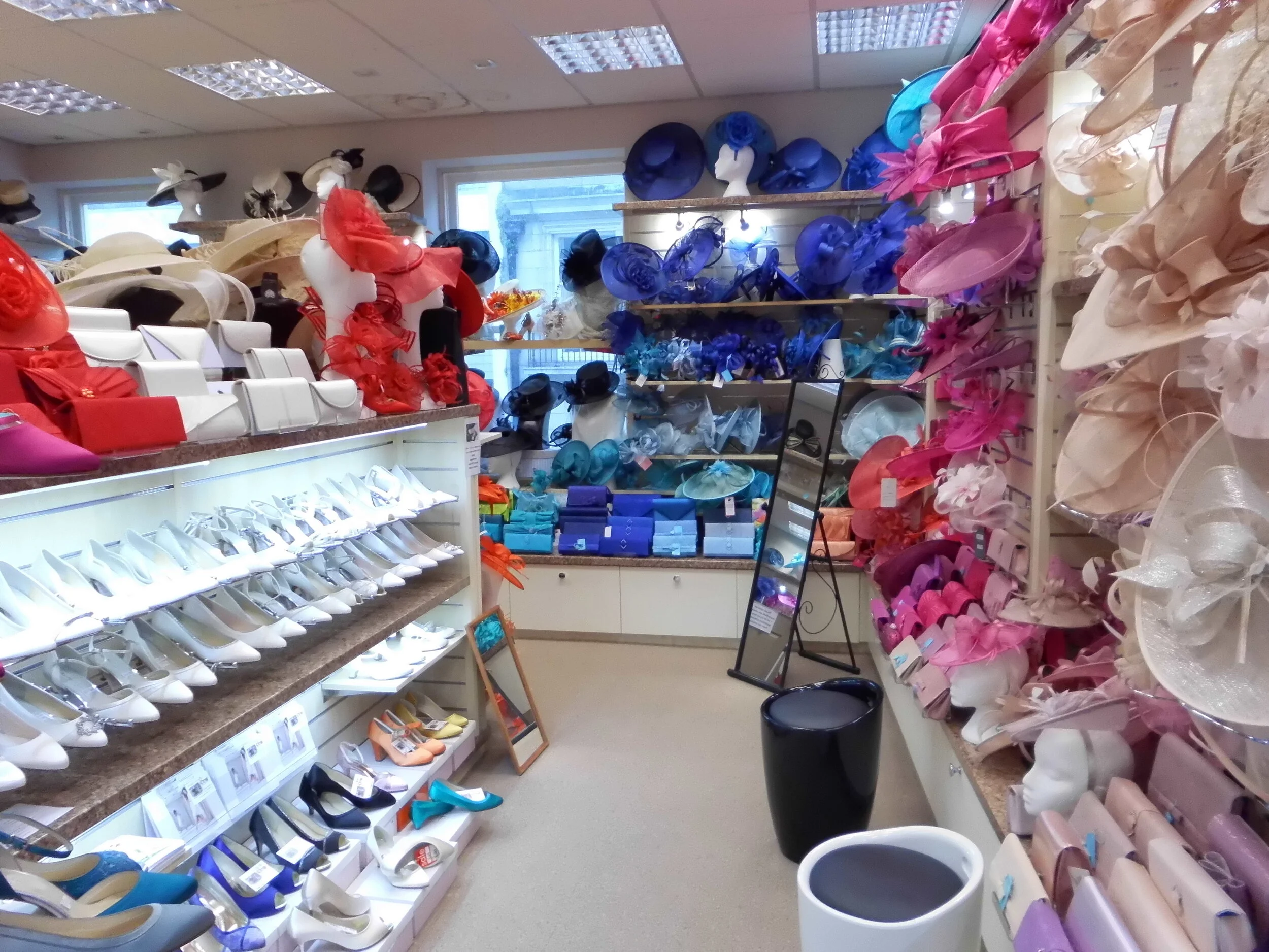 The Full range of Rainbow Club Bridal Shoes in Ivory on show and ready to try in our Wedding Hat Department