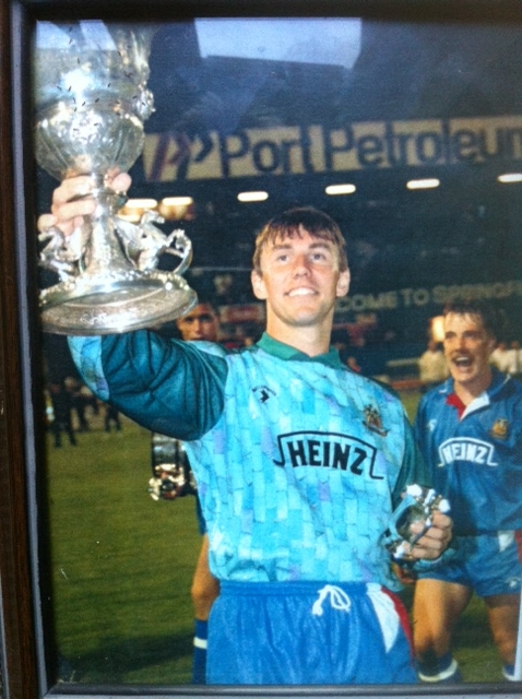 Holding the Lancashire Senior Cup as a player with Wigan Athletic