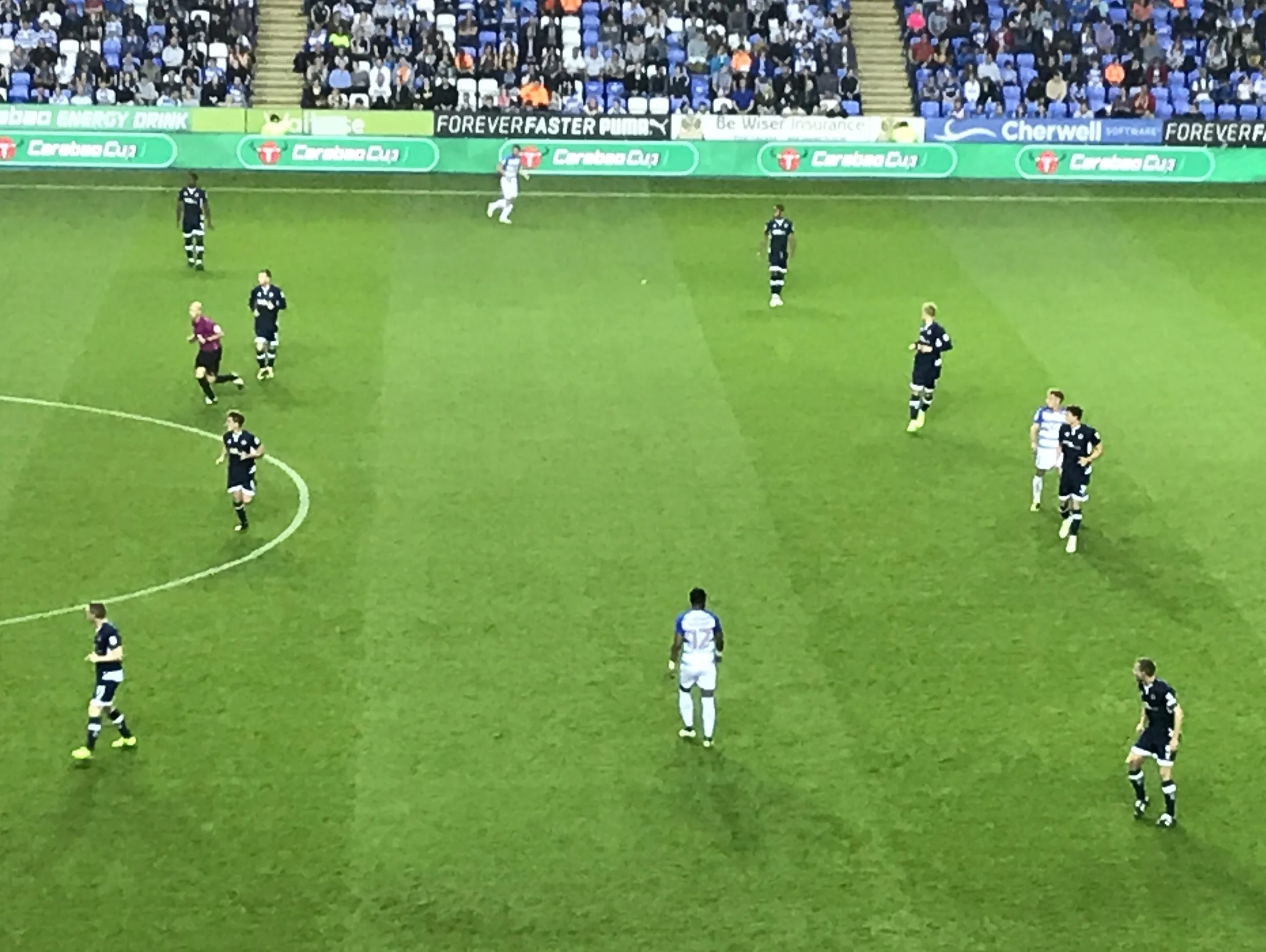 Jake Cooper playing left side centre back for Millwall v Reading in the Carabao Cup. Millwall defending with 2 banks of 4 and Reading looking to play between the lines with Gareth McCleary, No12, in space on the 1/2 turn waiting to receive the ball.