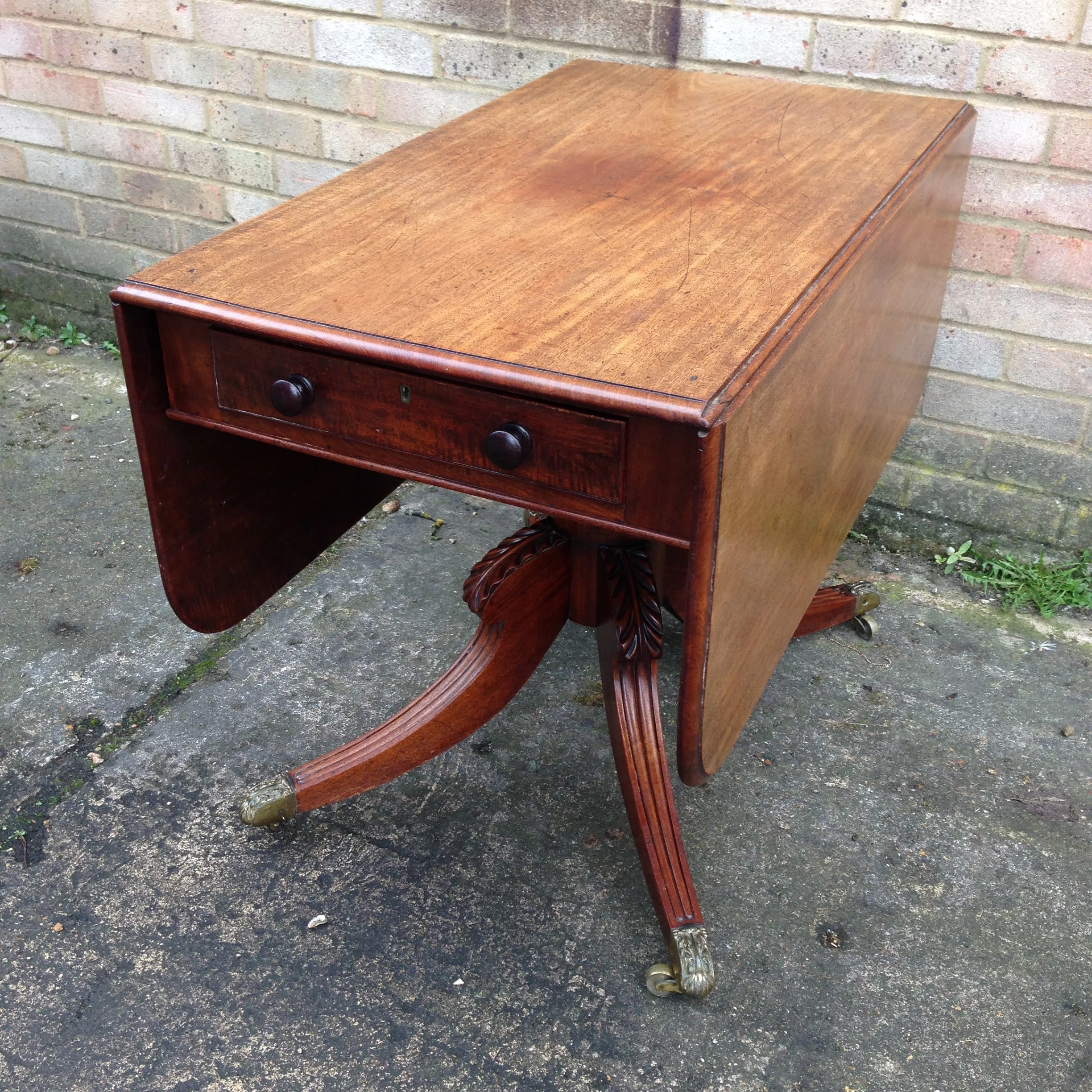 Antique Regency Mahogany Pedestal Pembroke Table With Drawer. On Brass Casters