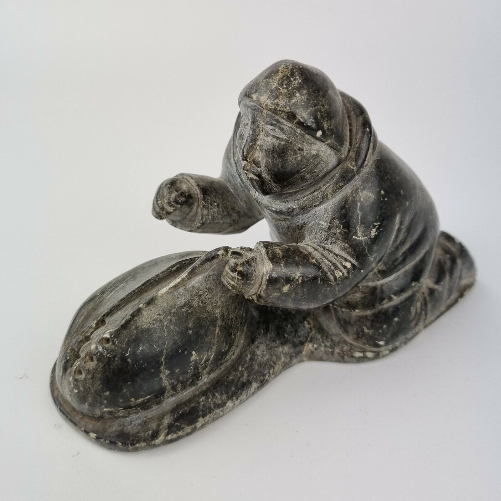 Vintage Eskimo Inuit Stone Carving Hunter Skinning A Seal Ultra Violet Marks