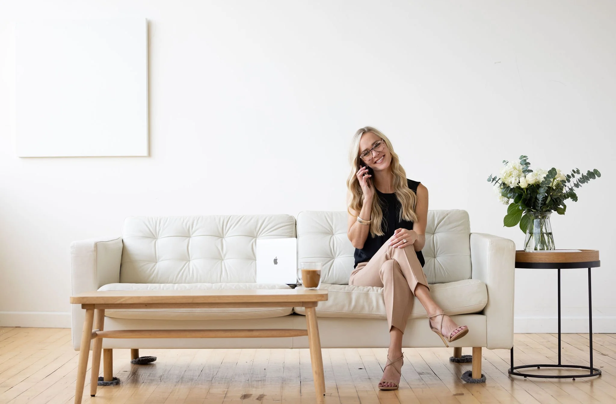 Lifestyle in-action branding photoshoot with female leader on couch