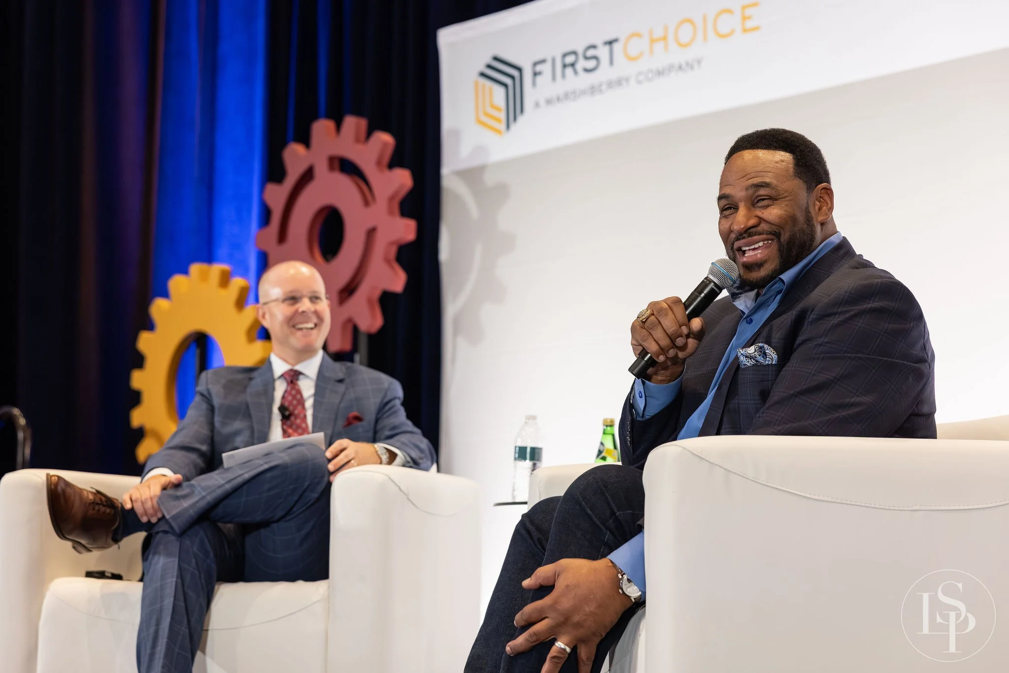 key note speaker Jerome Bennet on stage genuine moment photos