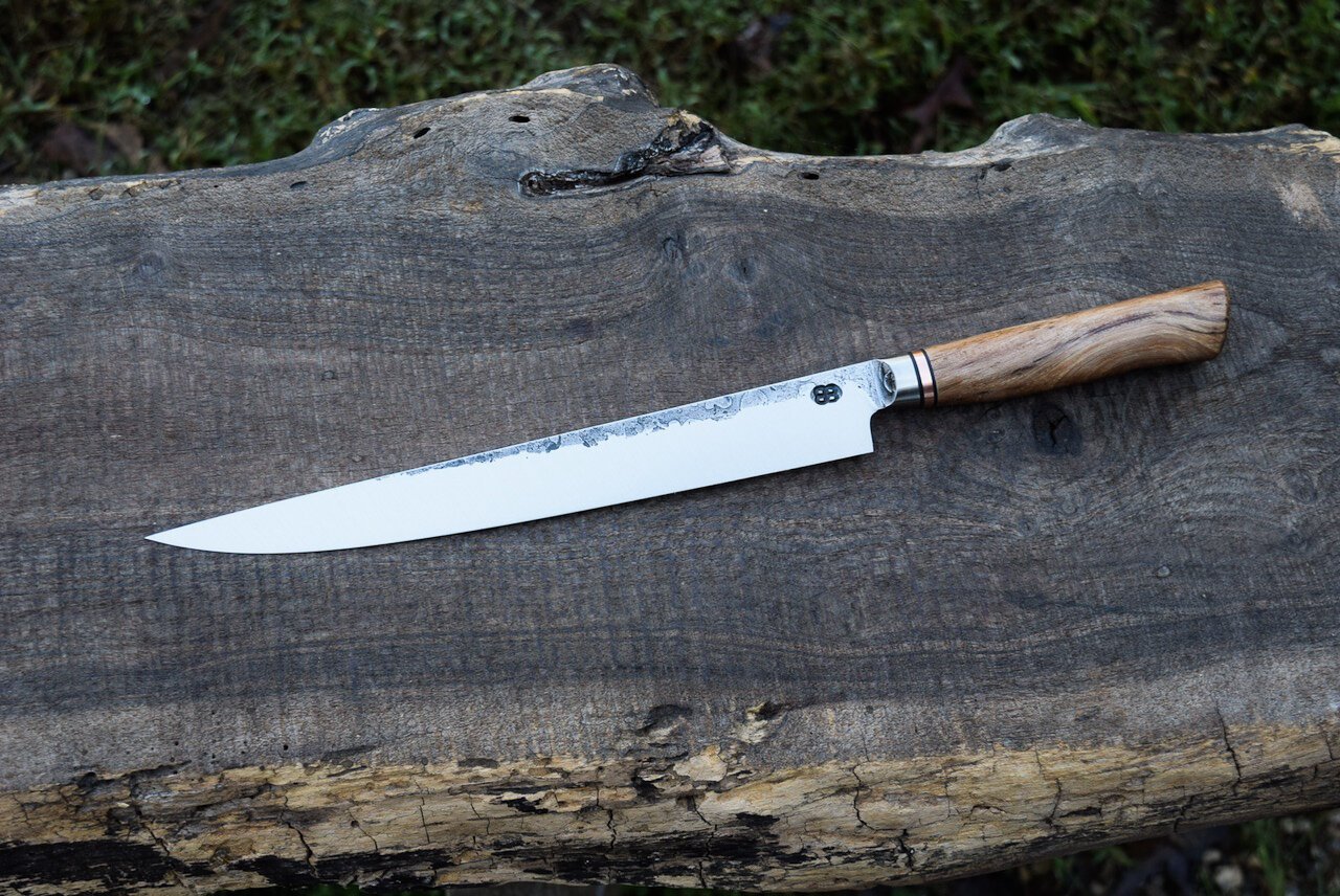  9” Integral Slicer with Forge Finish. Western Pecan Handle with Copper Spacer.  