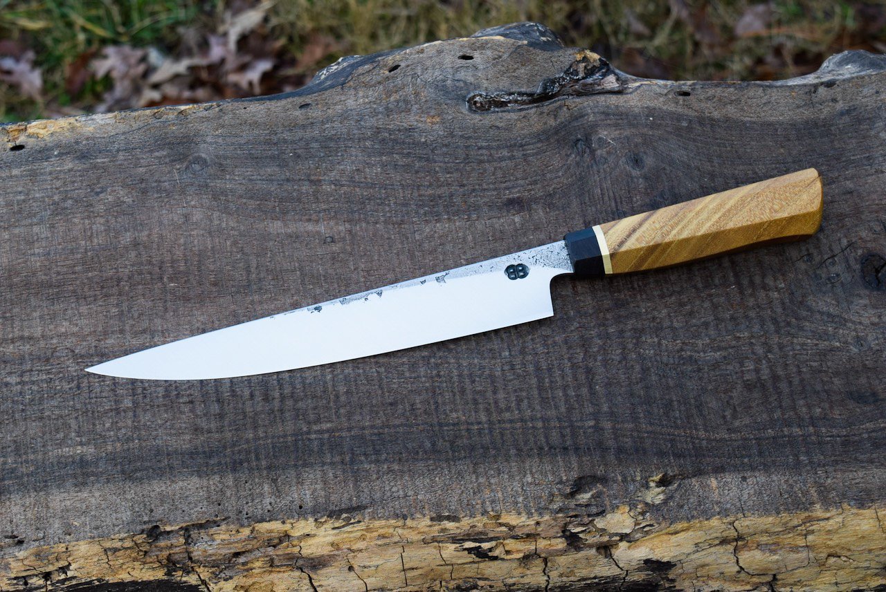  9” Hidden-Tang Slicer with Forge Finish. Westernized Octagonal Black Locust Handle with Blackwood Faceplate and Brass Spacer. 
