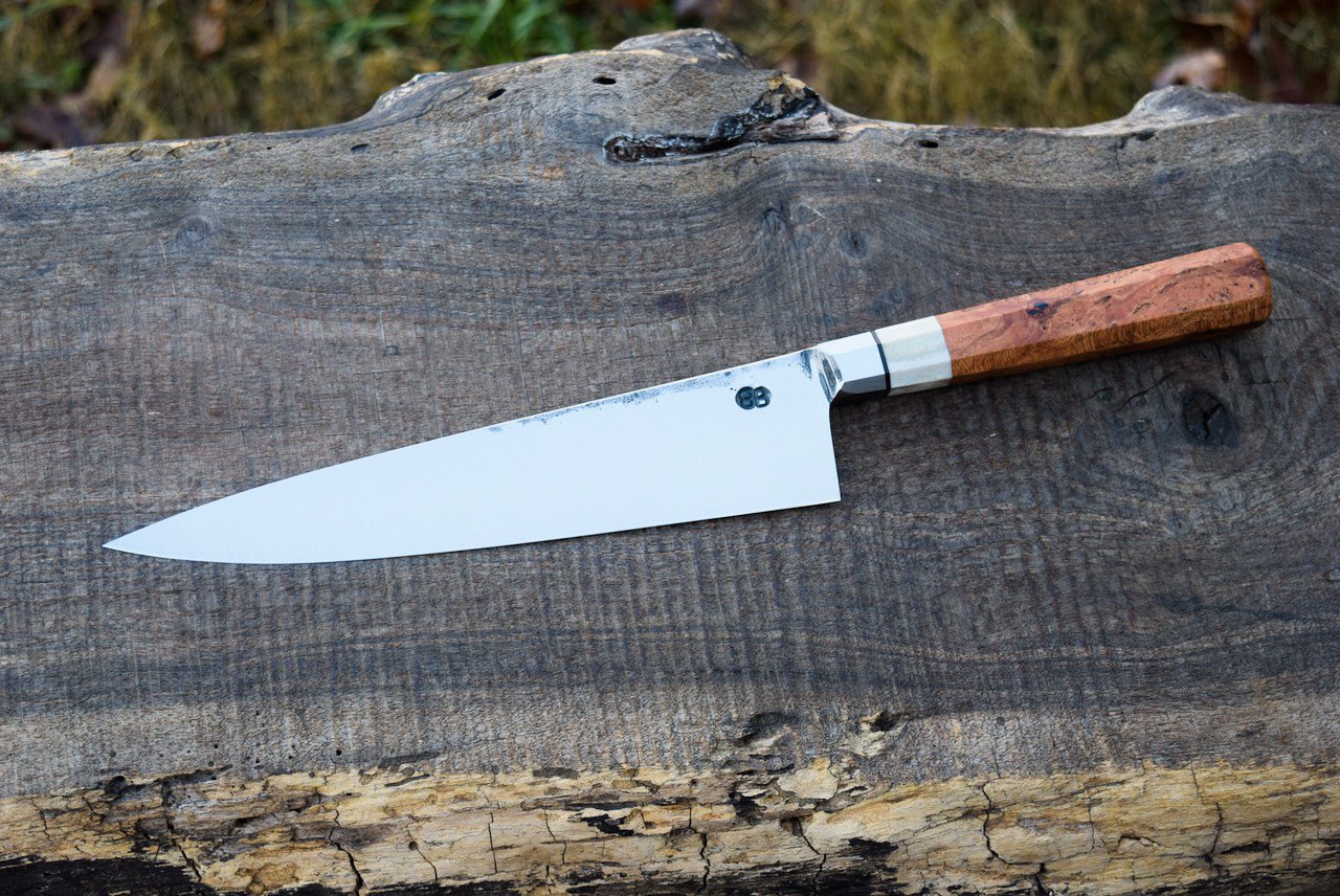  9” Integral Chef with Forge Finish.  Octagonal Cherry Burl Handle with an Antler Spacer. 