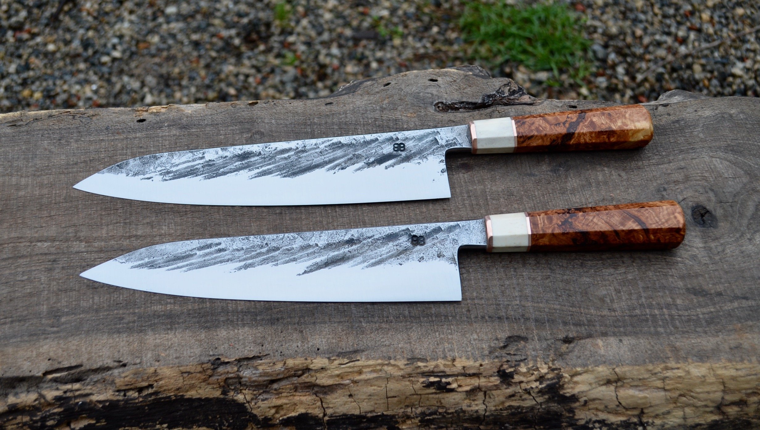  240mm Hidden-tang Yo Deba with forge finish. Octagonal Aspen Burl handles with copper faceplates and antler and copper spacers. 