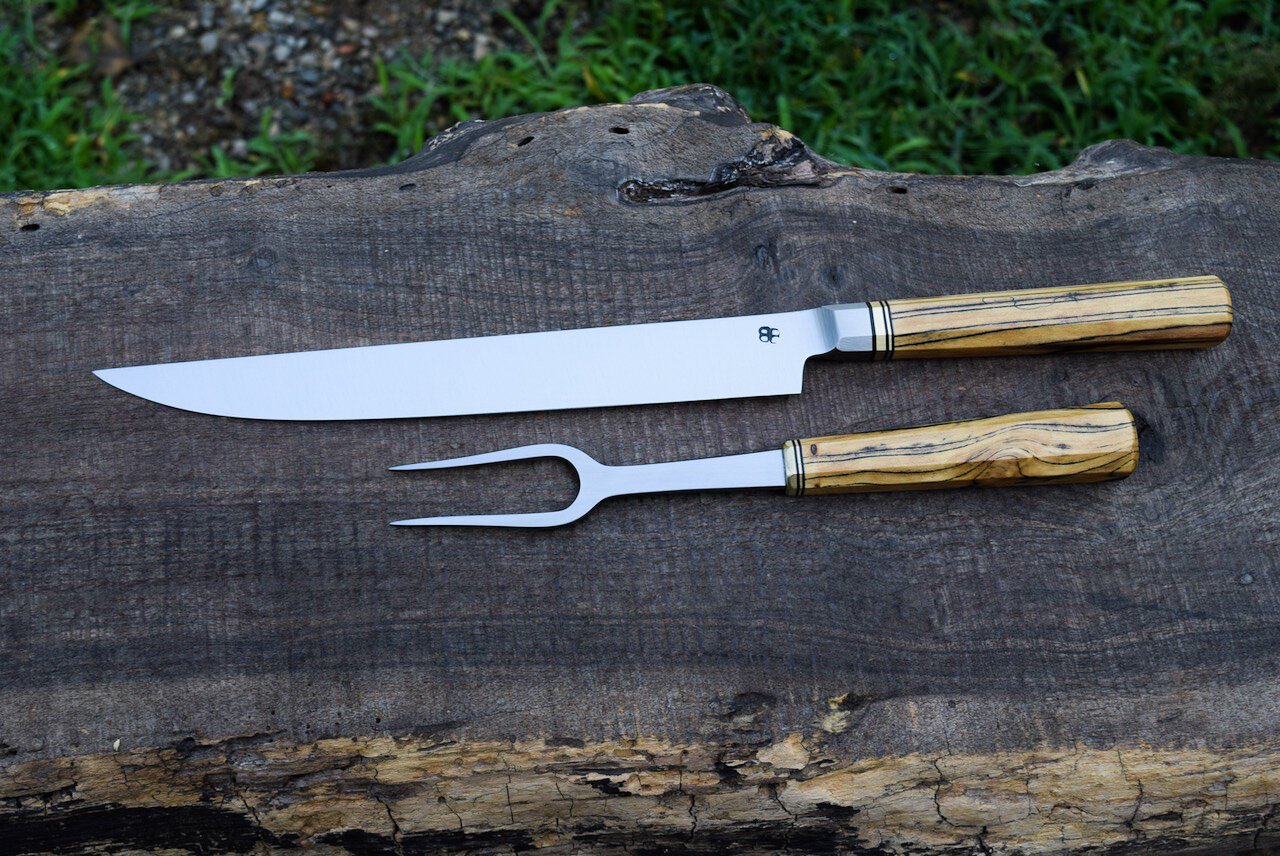  9” Integral Carving Knife with an Octagonal Spalted Elm Handle and Brass and Bronze Spacers.  Hidden-Tang Fork with an Octagonal Spalted Elm Handle and a Brass Faceplate and Bronze Spacer. 