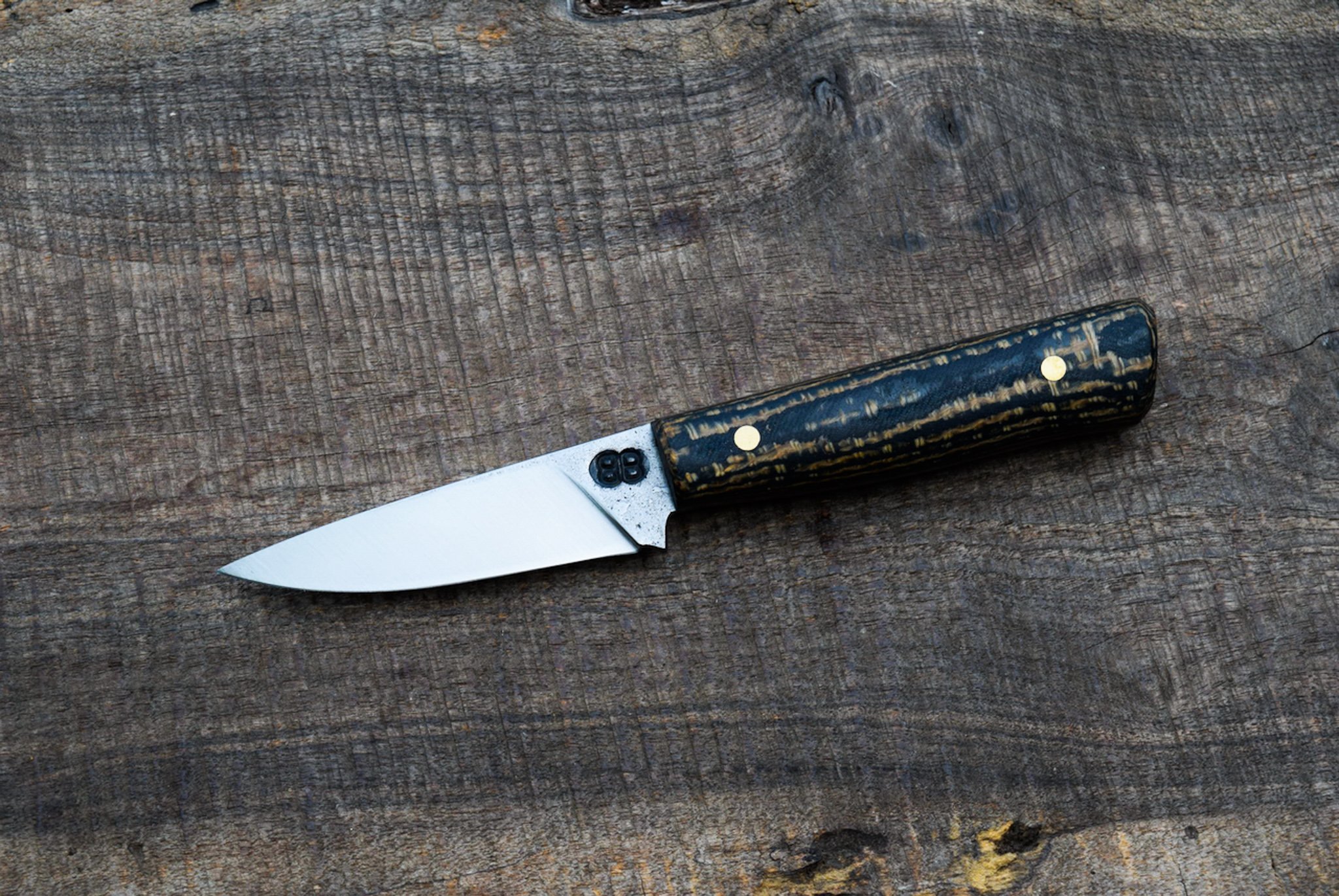  3.5” Full-Tang Belt Knife with Forge Finish. Western Fabric Laminate Handle with Brass Pins.  