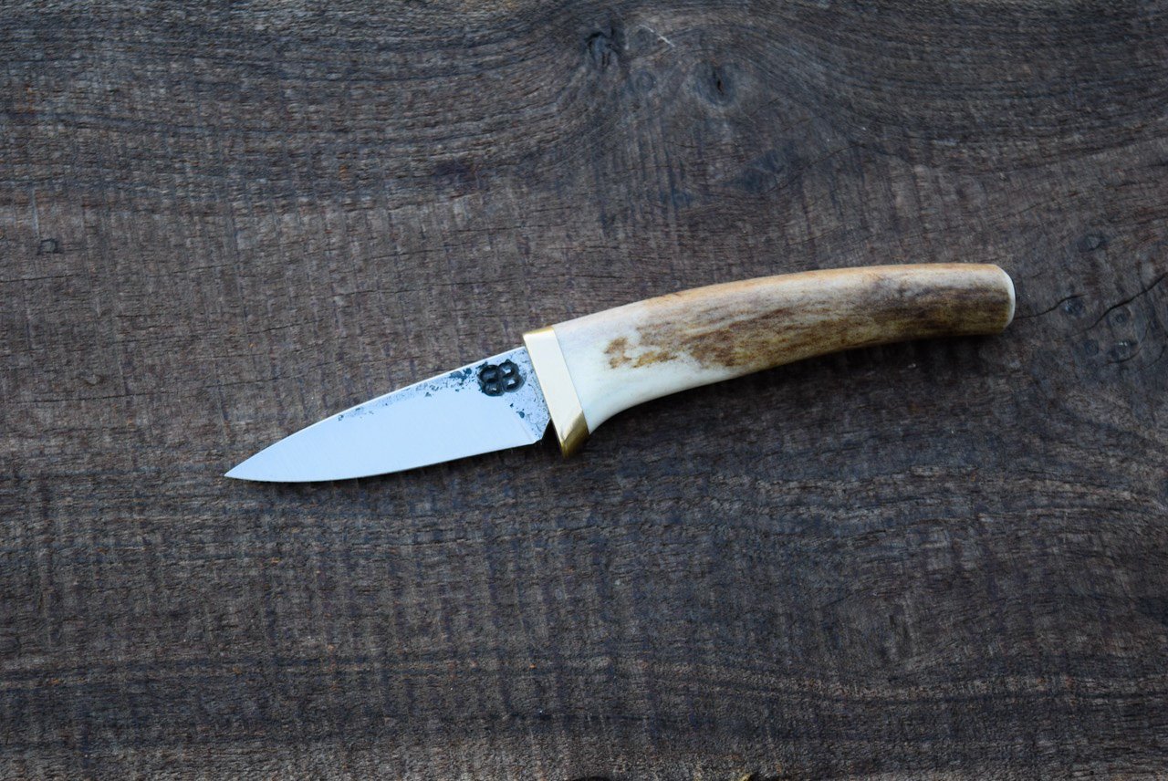  2.75” Antler Pocket with Forge Finish. Brass Guard with Antler Tine Handle.  