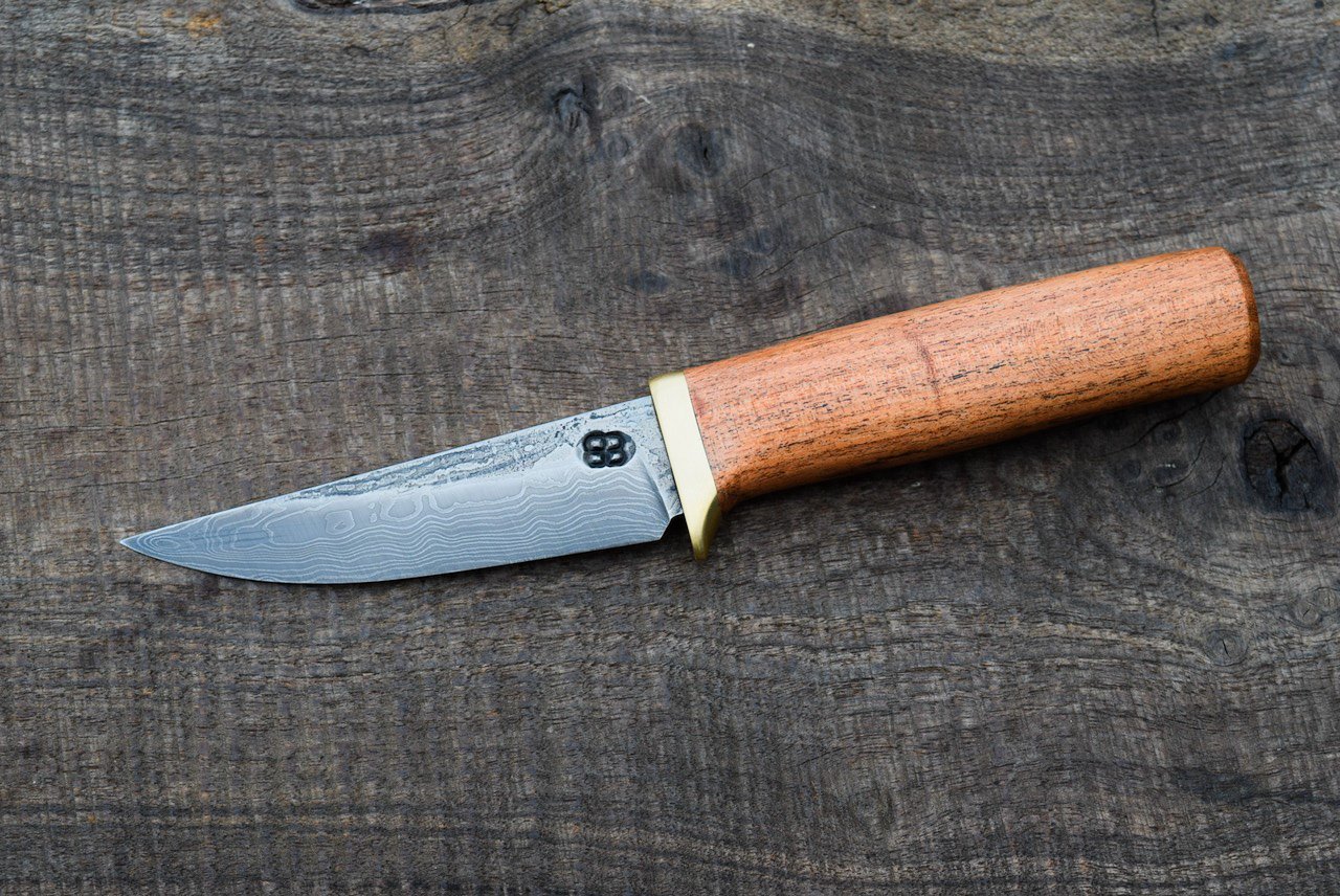  3.5” Swept  Damascus Hunter with Forge Finish. Brass Guard with Mesquite Handle.  