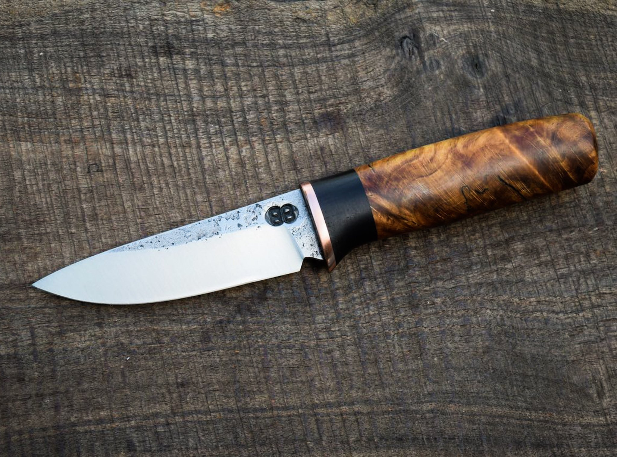  4” Drop Point Hunter with Forge Finish. Copper Guard with Blackwood Spacer and Chestnut Burl Handle. 
