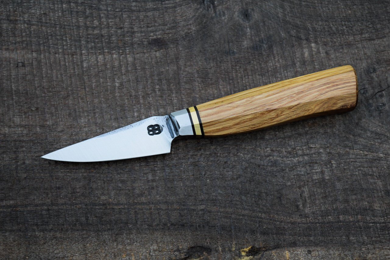  2.75” Integral Bird &amp; Trout with Forge Finish. Westernized Octagonal Oak Handle with Brass Spacer.  