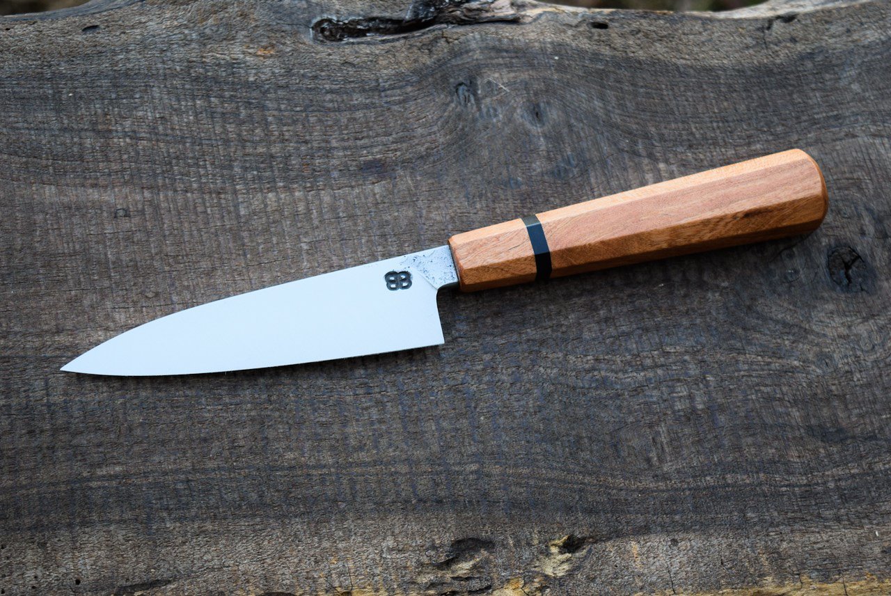  5” Hidden-Tang Petty with Forge Finish. Octagonal Cherry Handle with Blackwood Spacer.  