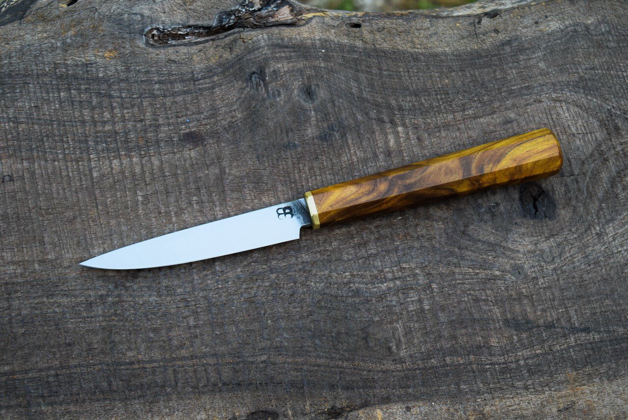  4.25” Hidden-Tang Paring with Retained Filemarks. Octagonal Redbud Handle with Brass Faceplate.  