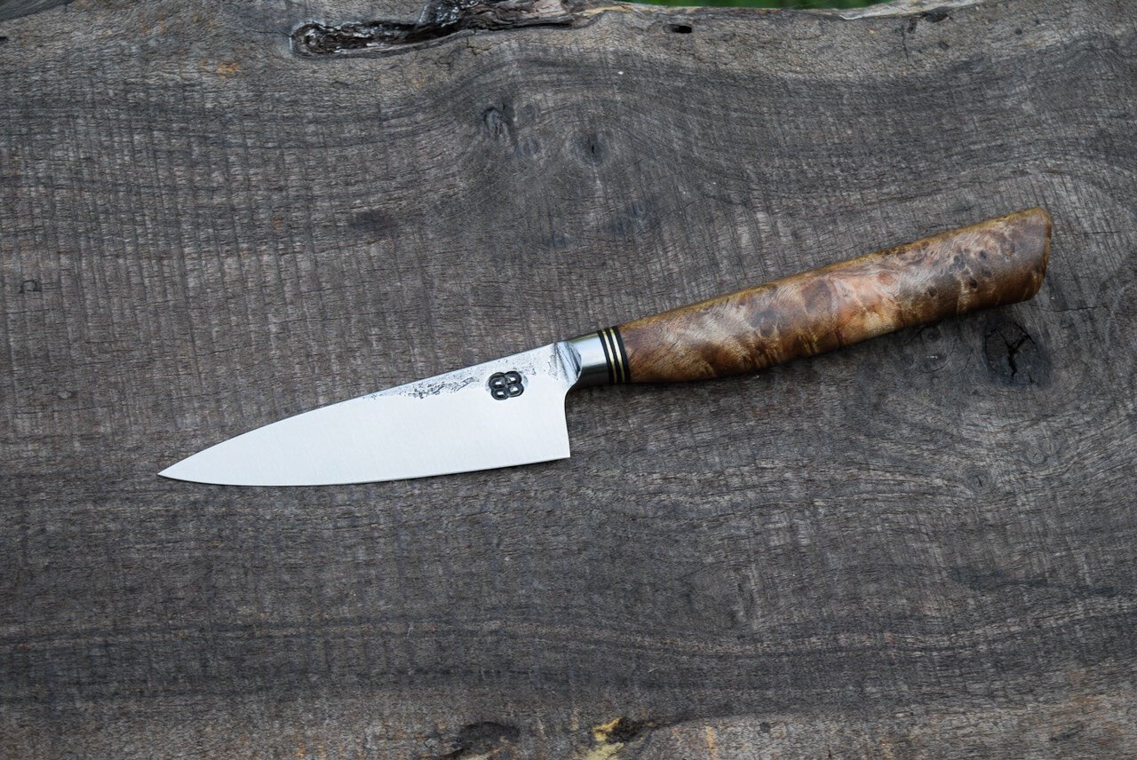  3.5” Integral Paring with Forge Finish. Western Spalted Maple Burl Handle with Bronze Spacers. 
