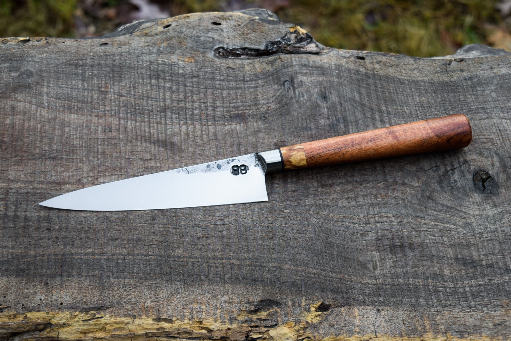  5.75” Integral Petty. Mesquite Right-Handed D-Handle with Spalted Copper Beech and Leather Spacers.  