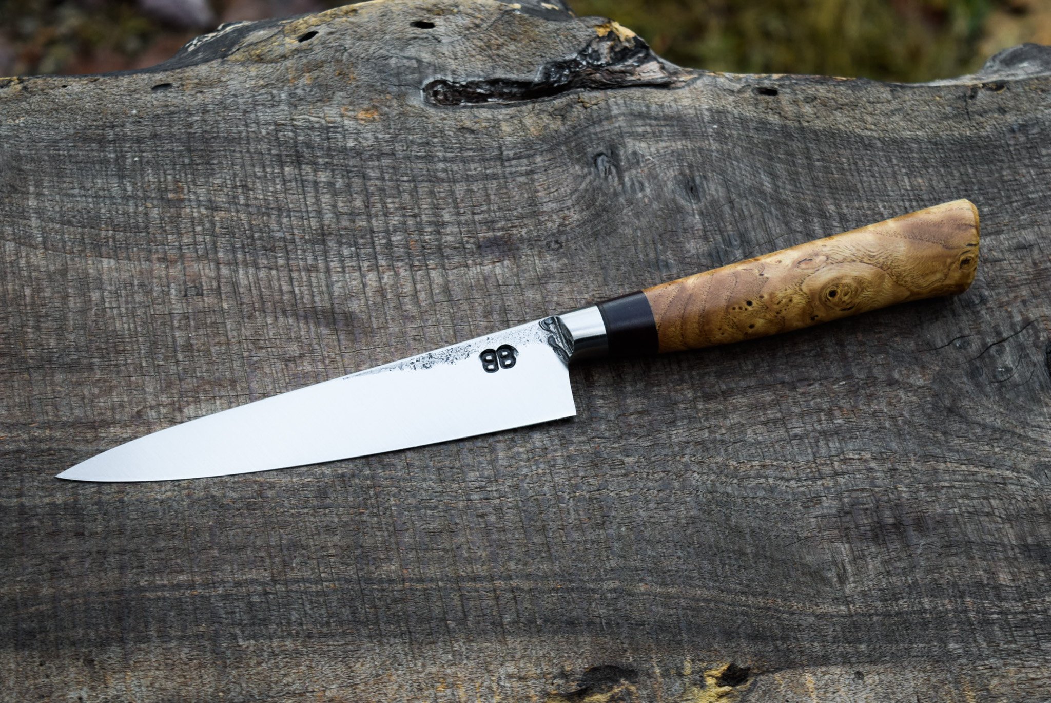  5.75” Integral Petty. Western Chestnut Burl Handle with Purple Heart and Leather Spacers.   