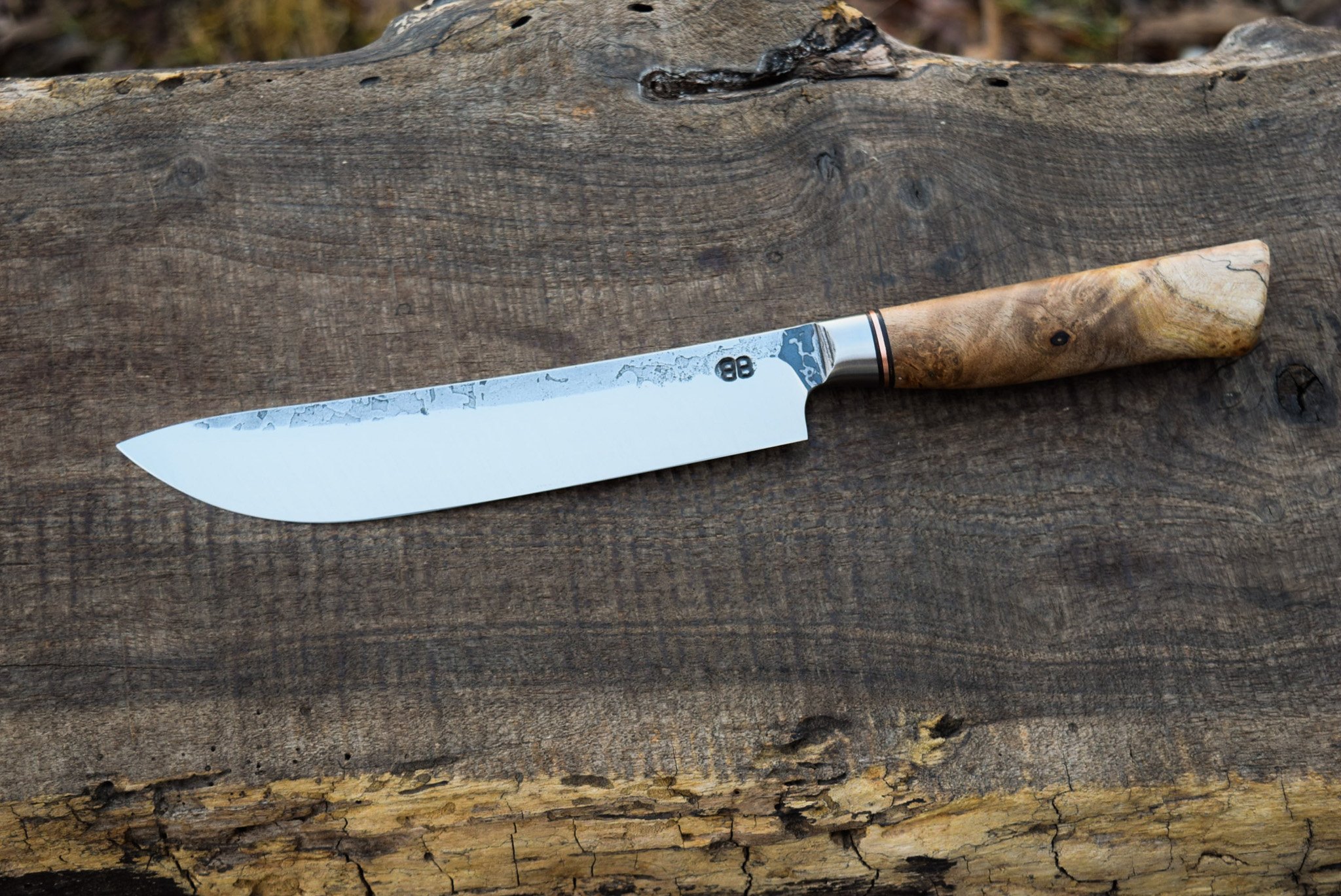 7.25" Integral Butcher. Westernized Octagonal Integral Maple Burl Handle with Leather and Copper Spacers.