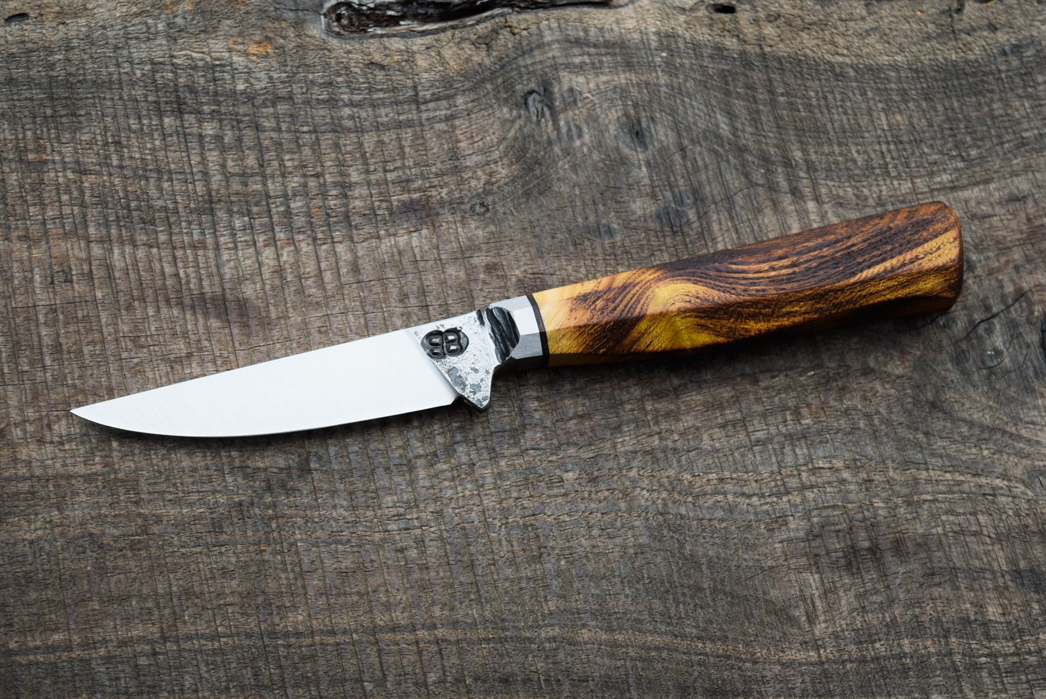  3.5" Bird &amp; Trout. Westernized Octagonal Integral Scorched Mulberry Handle with Leather Spacer.  