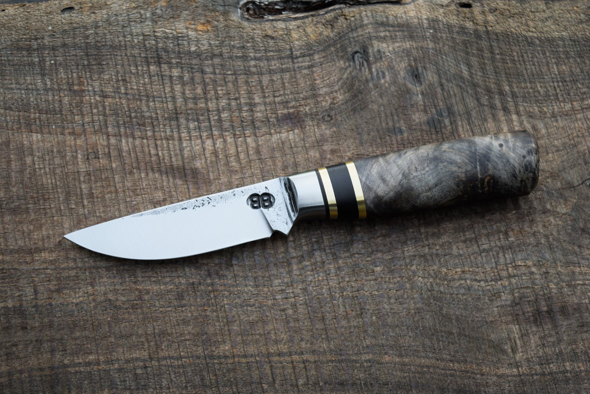  3.5" Integral Skinner. Integral Black-Dyed Maple Handle with Blackwood and Brass Spacers. 