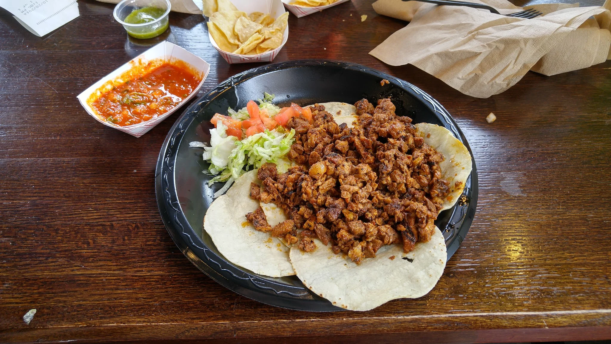 The pastor taco plate and an unknown, very potent, red salsa which I will have dreams about.
