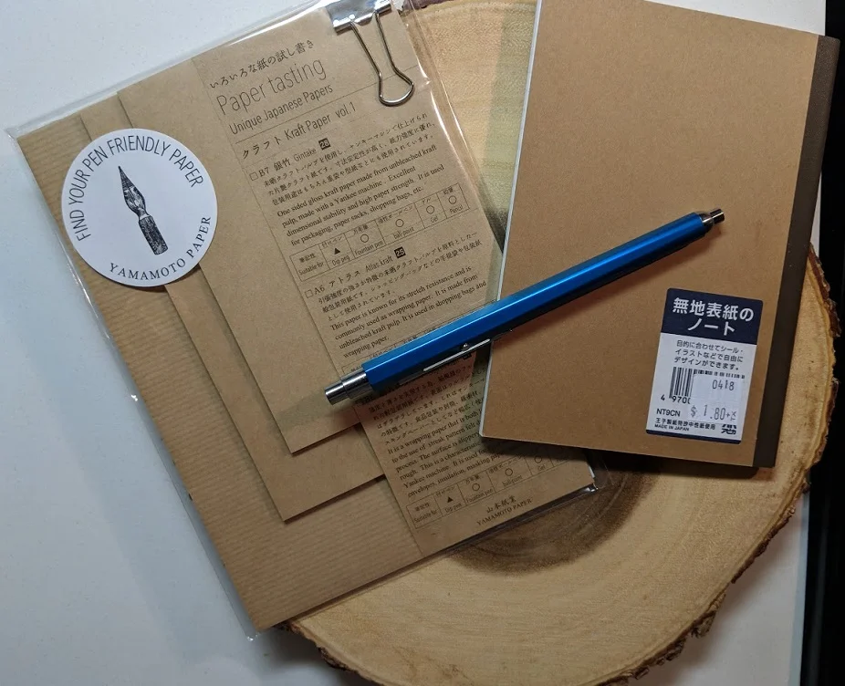 Shiny aluminum pencil! Oh, and real big spender on that notebook, Ridley…