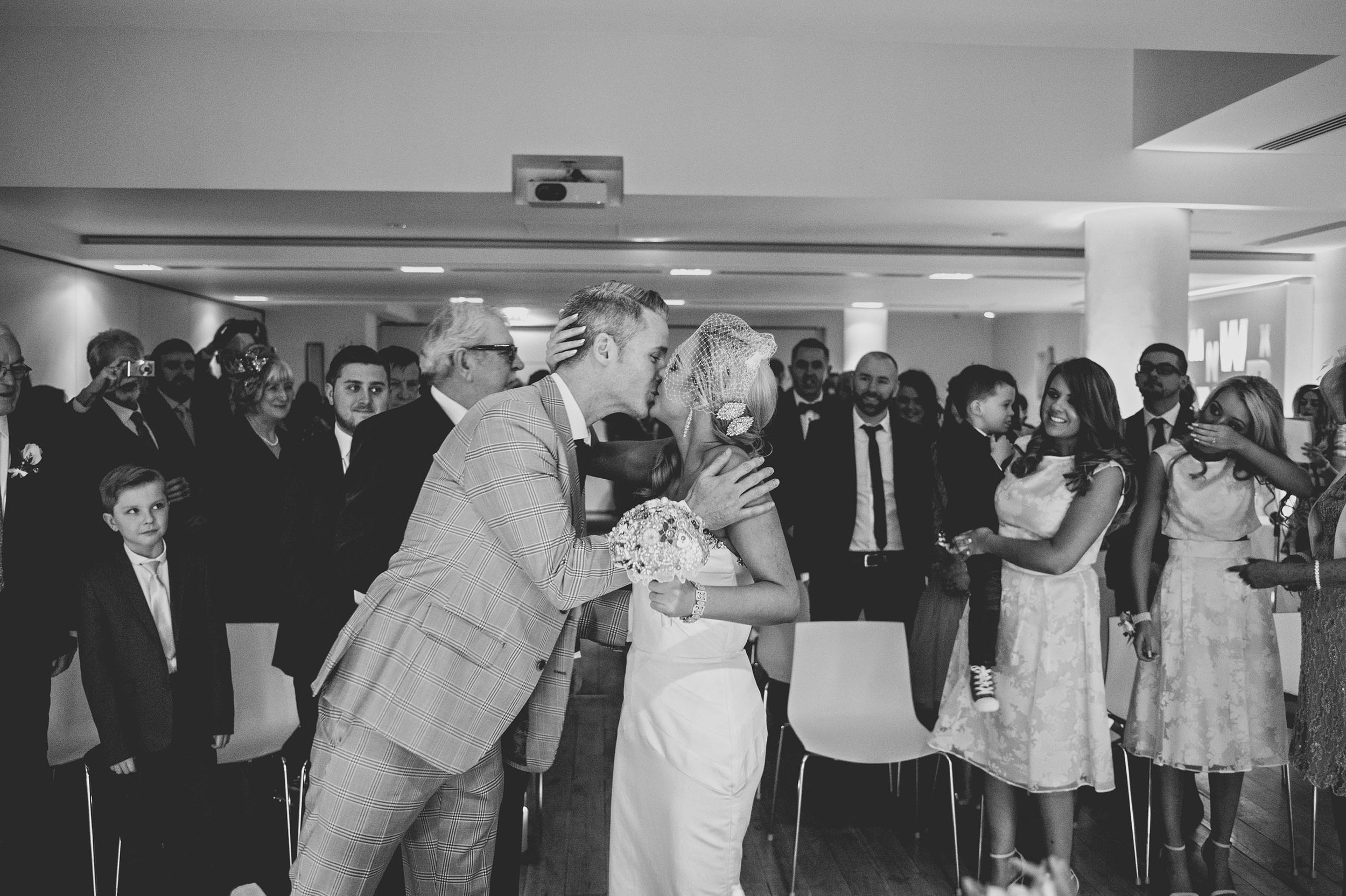 Groom kisses the bride