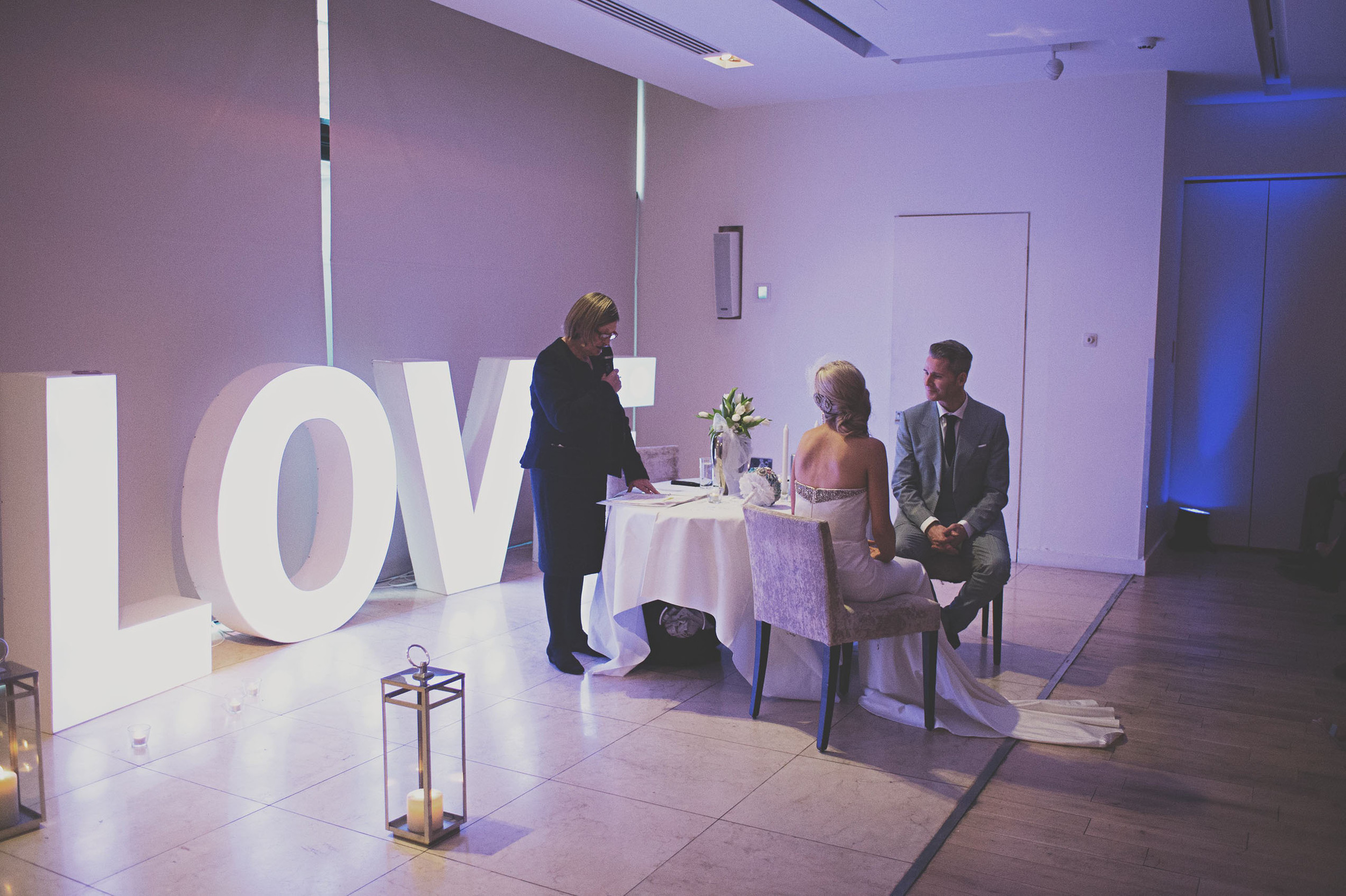 Celebrant talks to wedding couple