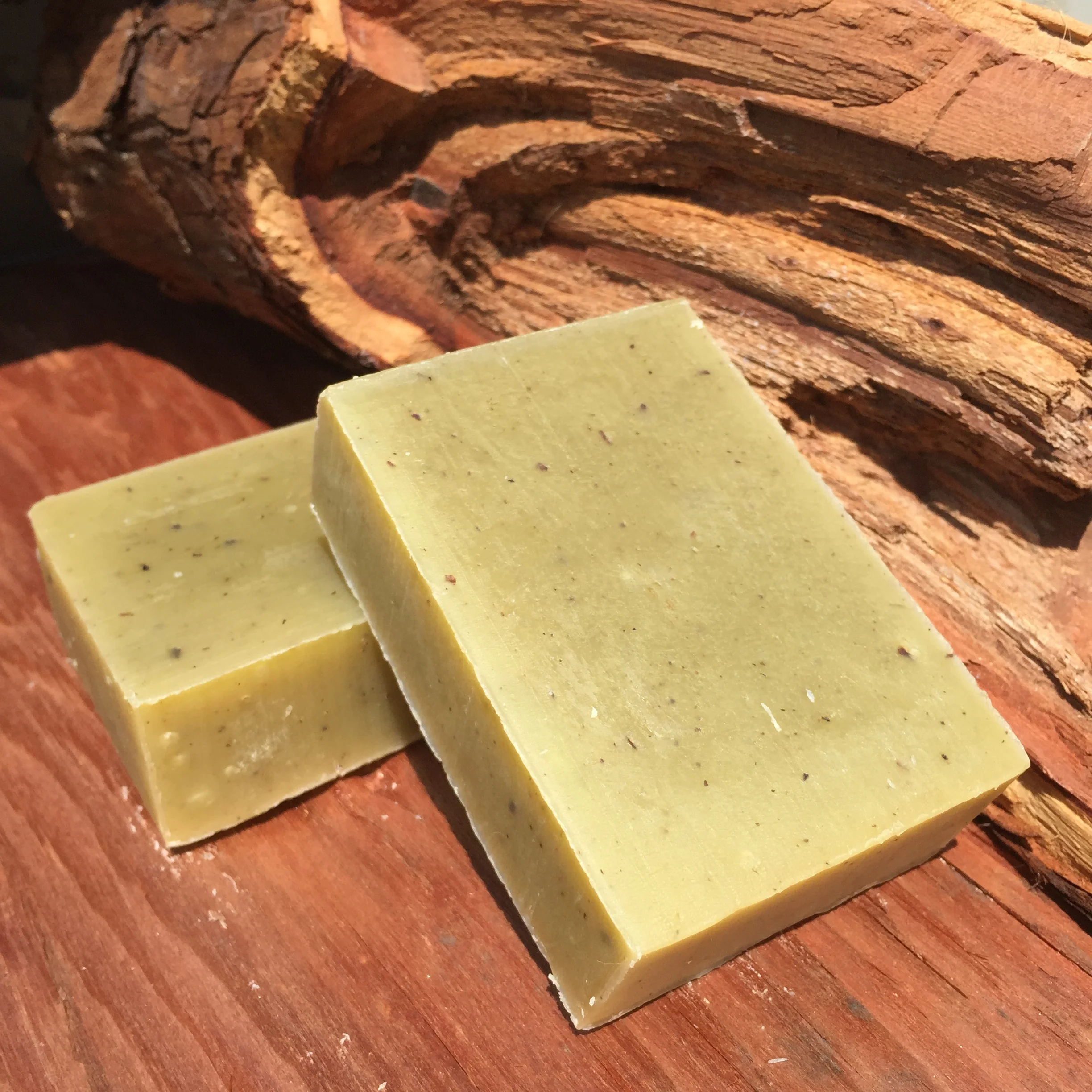     Tree Hugger      This bar is a tribute to our love and dedication to the wonderful forests of the Northwest. The combination of Cedarwood and Cypress pine essential oils are very grounding. They may suggest for us accept change, and can be suppor