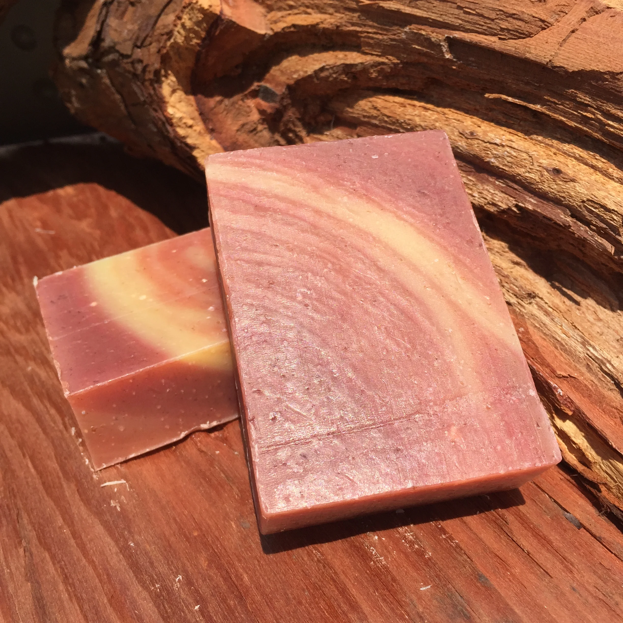     Grateful Pink Grapefruit      This bar looks great and packs a mild but uplifting blend. It has ground and whole organic oats throughout the bar to serve as an exfoliate base and moisturizing touch with Pink Grapefruit and Bergamot essential oils