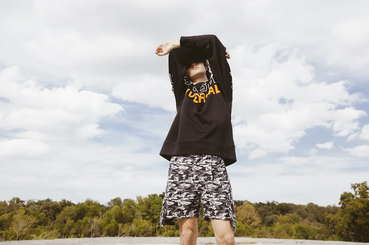 sweater: Rag & Bone, shorts: Kenneth Ning