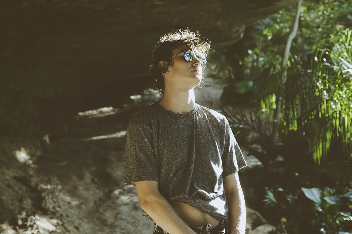glasses: Dior, t-shirt: Rag & Bone, shorts: Kenneth Ning