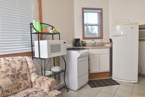 Lucky Horseshoe Cabin #21 - Interior Sitting and Kitchen Area.JPG