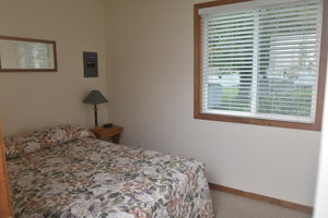 Lucky Horseshoe Cabin #21 - Interior 1st Bedroom with Full Bed.JPG