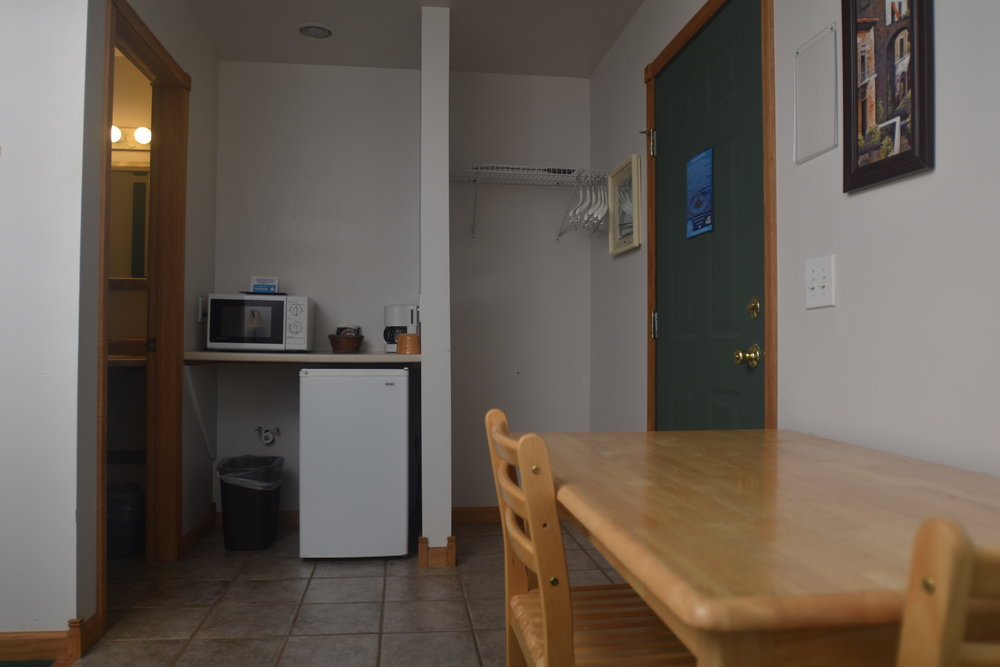Blue Spruce Motel - Room Number 12 - Interior Entry and Fridge.jpeg