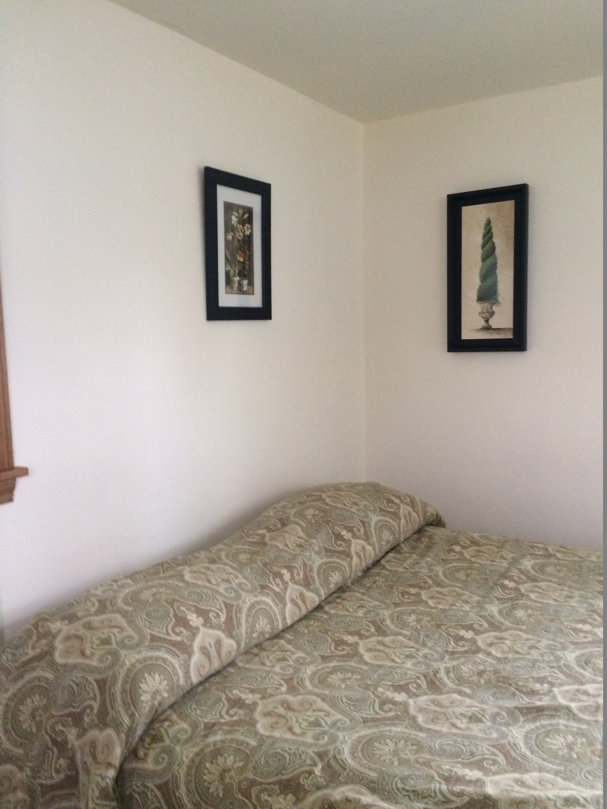 Blue Spruce Motel - Cabin Number 18 (1) - Interior Bed and Art.jpg