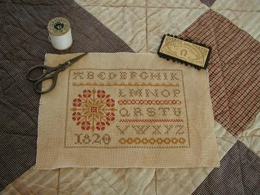 Primrose Sampler Cover Photo, copyright Threadwork Primitives 2011