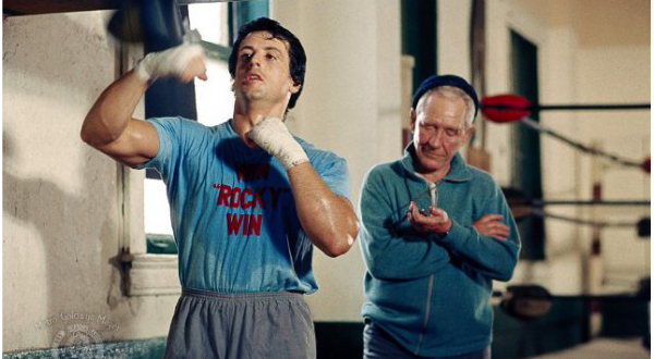 "Rocky" (1976) Rocky Balboa, a small-time boxer gets a supremely rare chance to fight the heavy-weight champion, Apollo Creed. Sylvester Stallone wore this "Win Rocky Win" t-shirt while training hard for the fight.